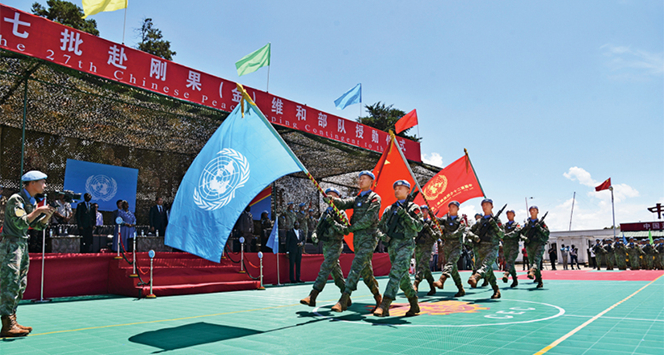 高舉人類命運(yùn)共同體旗幟 推動世界走向光明前景